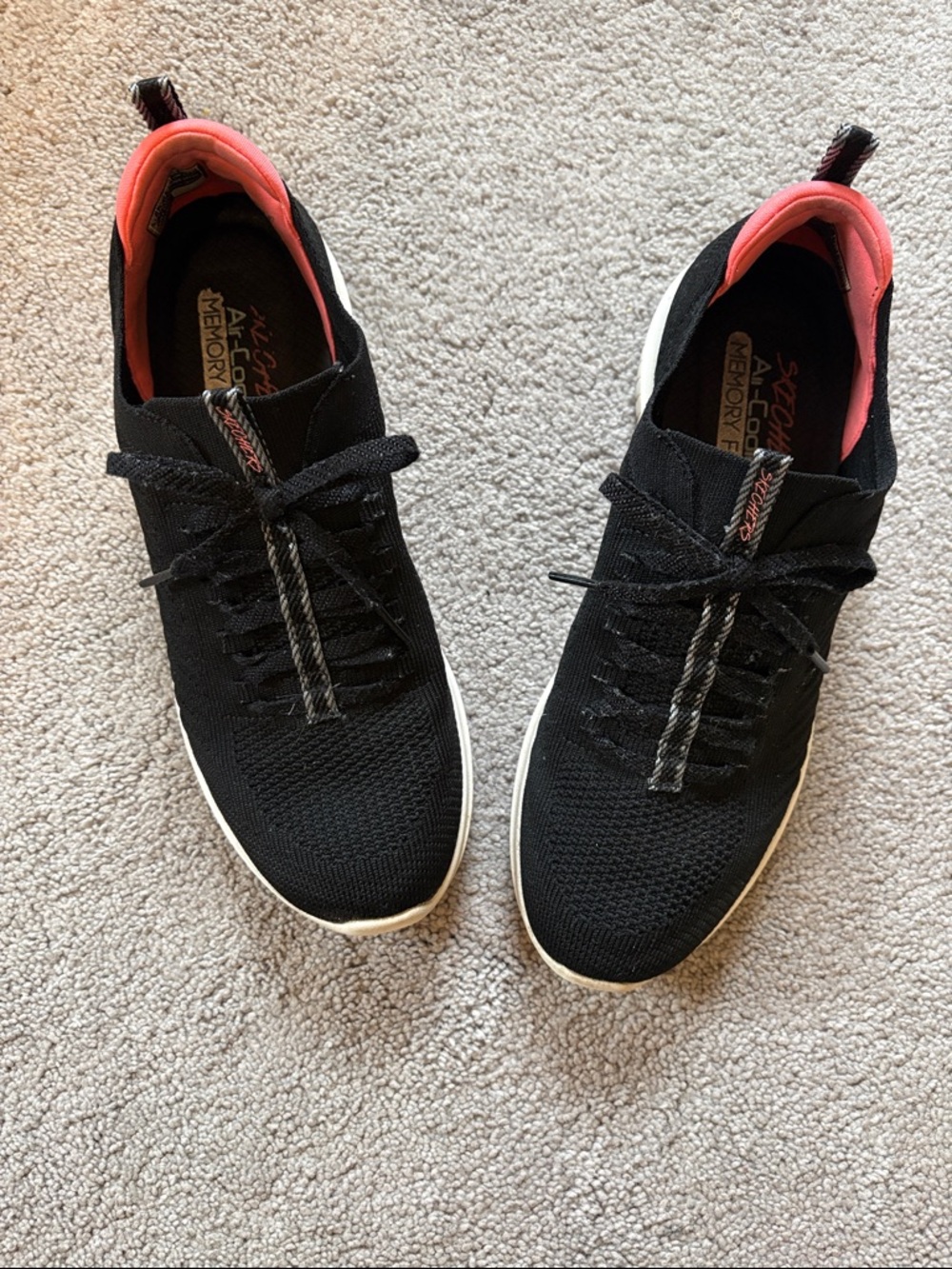 Skechers WOMEN’s Black Knit Sneakers with pink Lining.  Size 11B